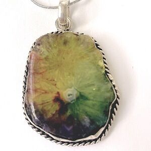 1 1/2 inch Rainbow Solar Quartz, 925 marked pendant on a silver chain